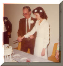 George & Sharon cutting the cake.